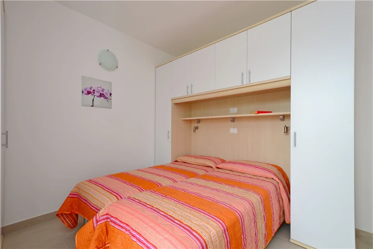 Slunečníky a lehátka na pláži v Lignanu | Lignano / Residence Fiore