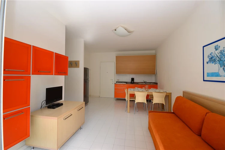 Terasa s posezením u bungalovu v Parco Hemingway | Lignano / Villaggio Parco Hemingway