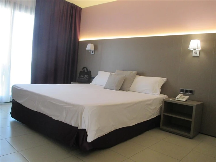 Útulný pokoj hotelu Fenals Garden s lůžky | Lloret de Mar / Hotel Fenals Garden