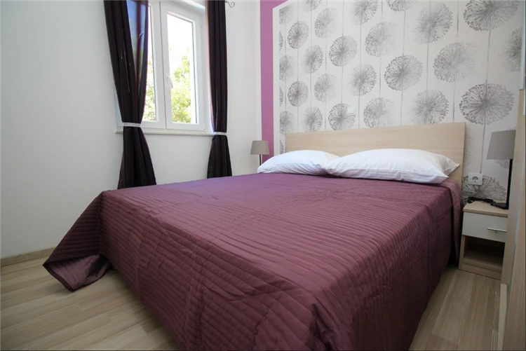 Ložnice s lůžky v apartmánu Gorica 1 Baška | Baška / Apartmánový dům Gorica 1