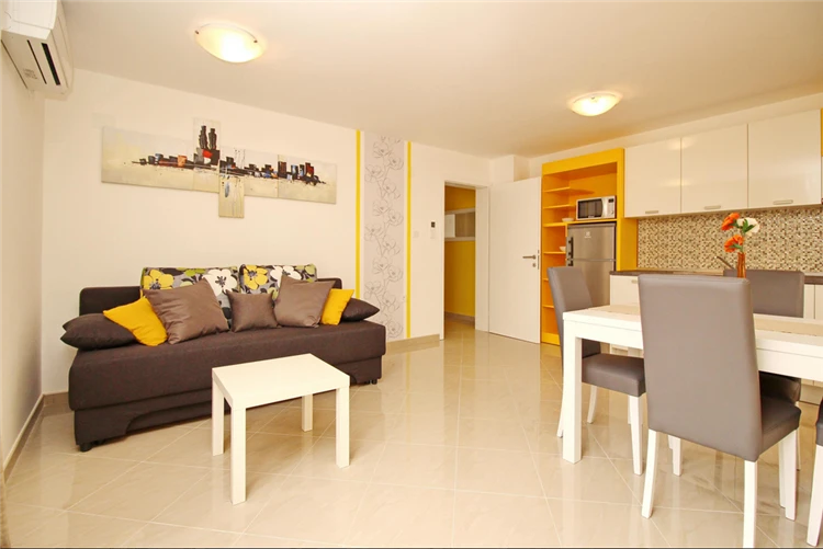 Obývací pokoj apartmánu Gorica 2 v Bašce | Baška / Apartmánový dům Gorica 2