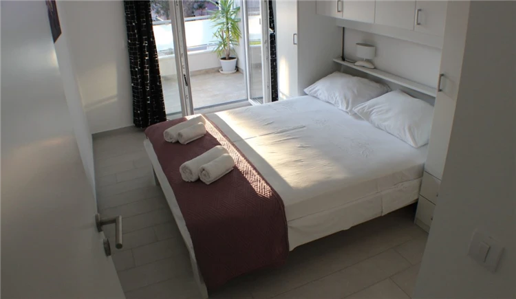 Ložnice apartmánu Danica Promajna s lůžky | Promajna / Apartmánový dům Danica