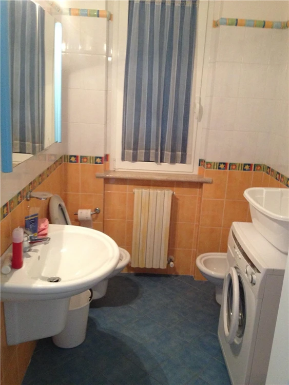 Ložnice apartmánu Le Primule s postelí | San Benedetto del Tronto / Apartmány Le Primule