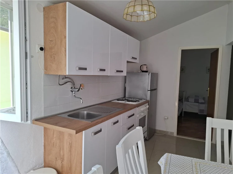 Pokoj s lůžky v apartmánu Cvitanović, Baška Voda | Baška Voda / Apartmánový dům Cvitanović