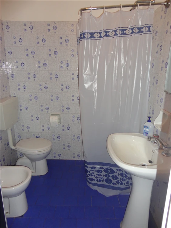 Residence Cutter – koupelna v apartmánu Porto Santa Margherita | Caorle - Porto Santa Margherita / Residence Cutter