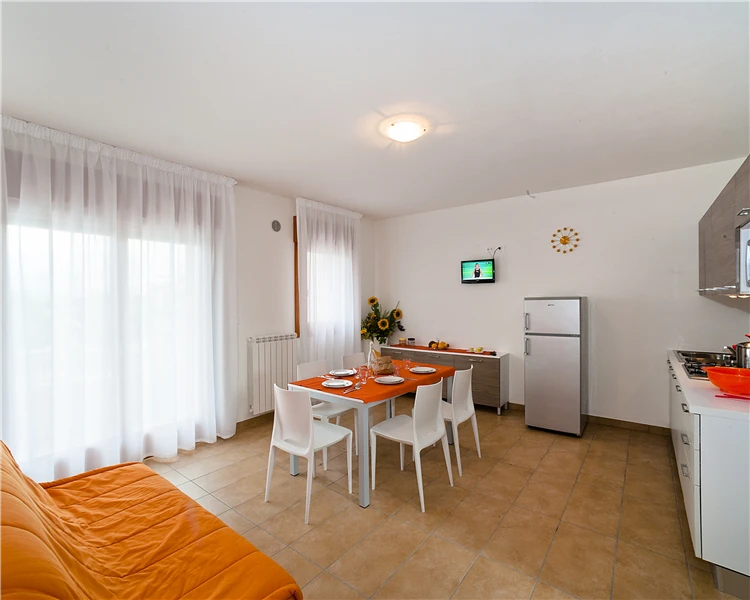 Interiér obývacího pokoje v apartmánu Galleria Gran Mado | Caorle / Residence Galleria Gran Mado