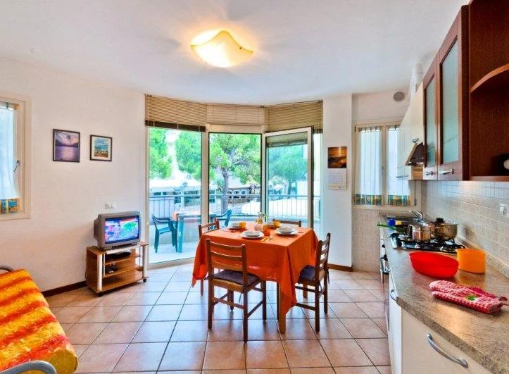 Ložnice s lůžky v apartmánu Residence Caravelle v Caorle | Caorle / Residence Caravelle