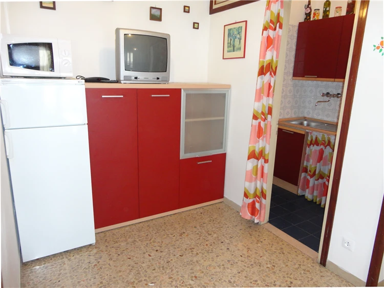 Residence Pleiadi – exteriér ubytování obklopený zelení | Caorle - Porto Santa Margherita / Residence Pleiadi