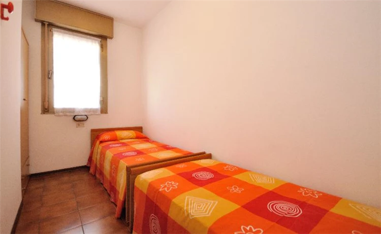 Dětský pokoj nebo ložnice apartmánu Residence Tiepolo | Bibione / Residence Tiepolo