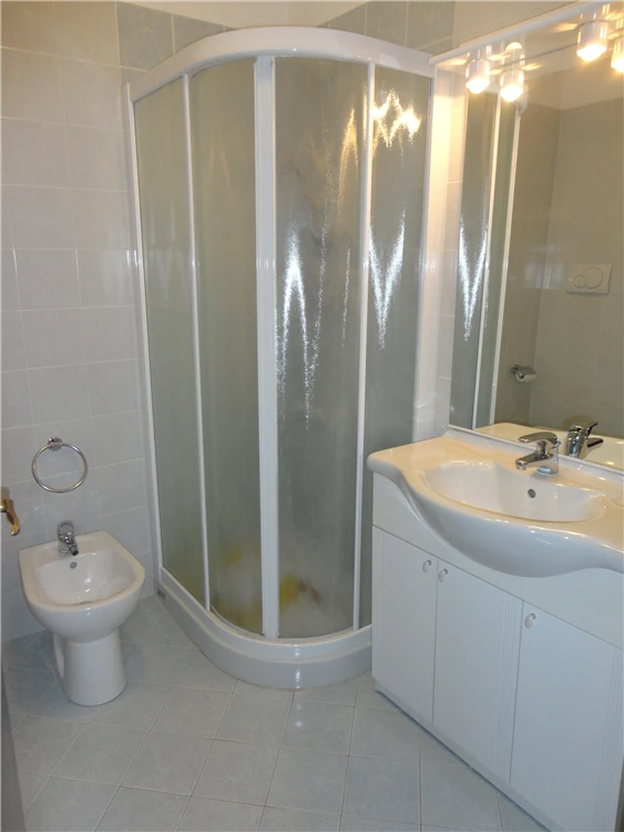 Koupelna apartmánu v Residence Acapulco | Caorle - Porto Santa Margherita / Residence Acapulco
