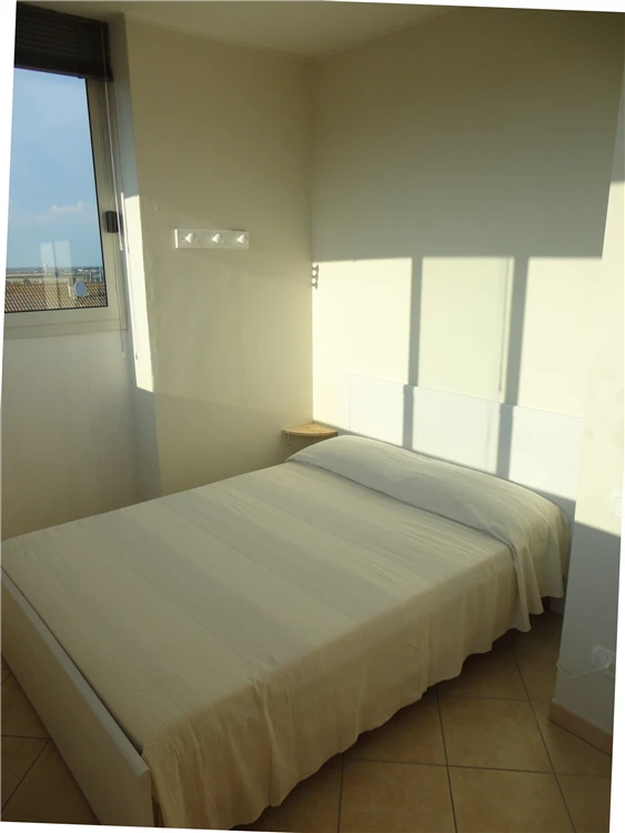 Ložnice apartmánu 31a v Residence Acapulco | Caorle - Porto Santa Margherita / Residence Acapulco