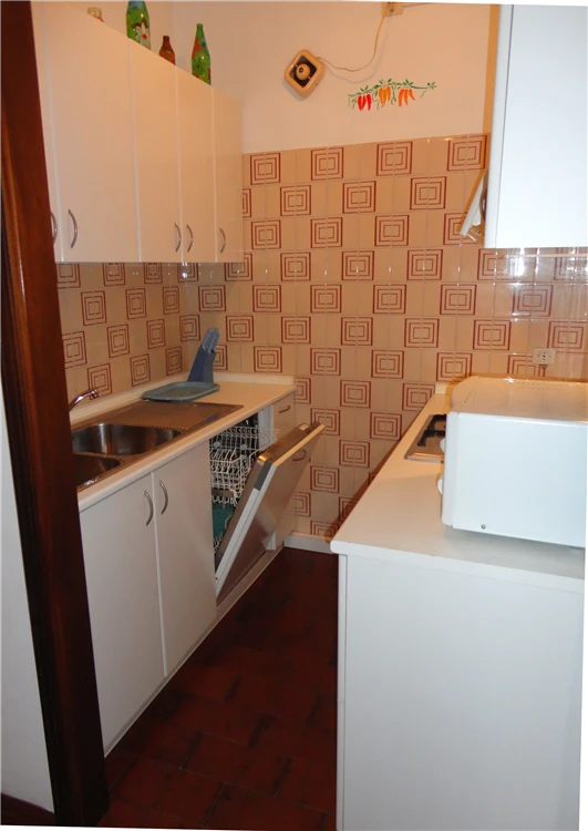 Kuchyň apartmánu c10 v Residence Acapulco | Caorle - Porto Santa Margherita / Residence Acapulco